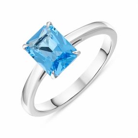 18ct White Gold Blue Topaz Emerald Cut Solitaire Ring D