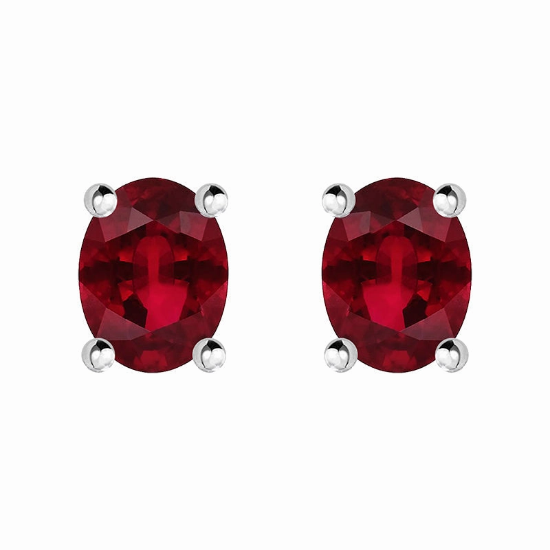 18ct White Gold Ruby 4x3mm Oval Claw Set Stud Earrings D