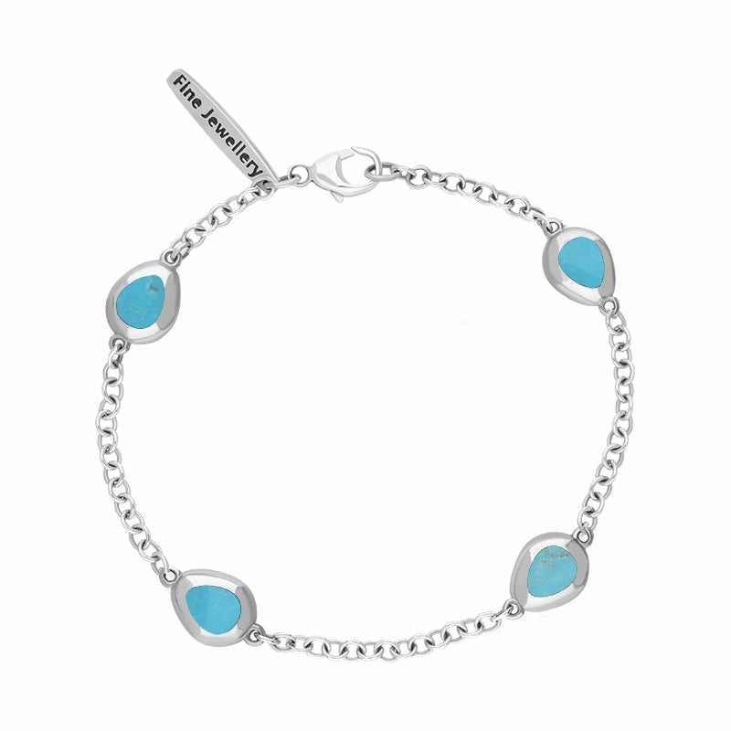 18ct White Gold Turquoise Oval Cross Detail Four Stone Bracelet