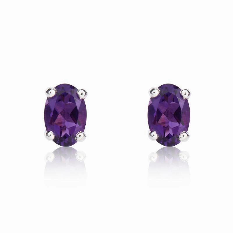 9ct White Gold Amethyst 6x4mm Oval Claw Set Stud Earrings