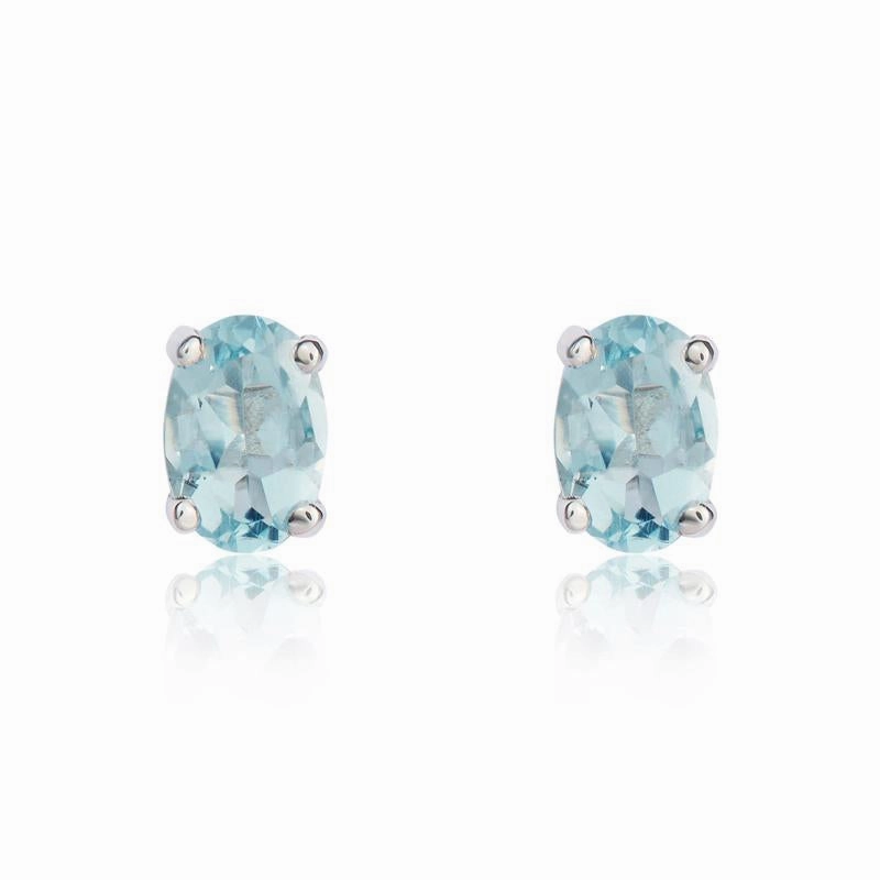 9ct White Gold Aquamarine 6x4mm Oval Claw Set Stud Earrings