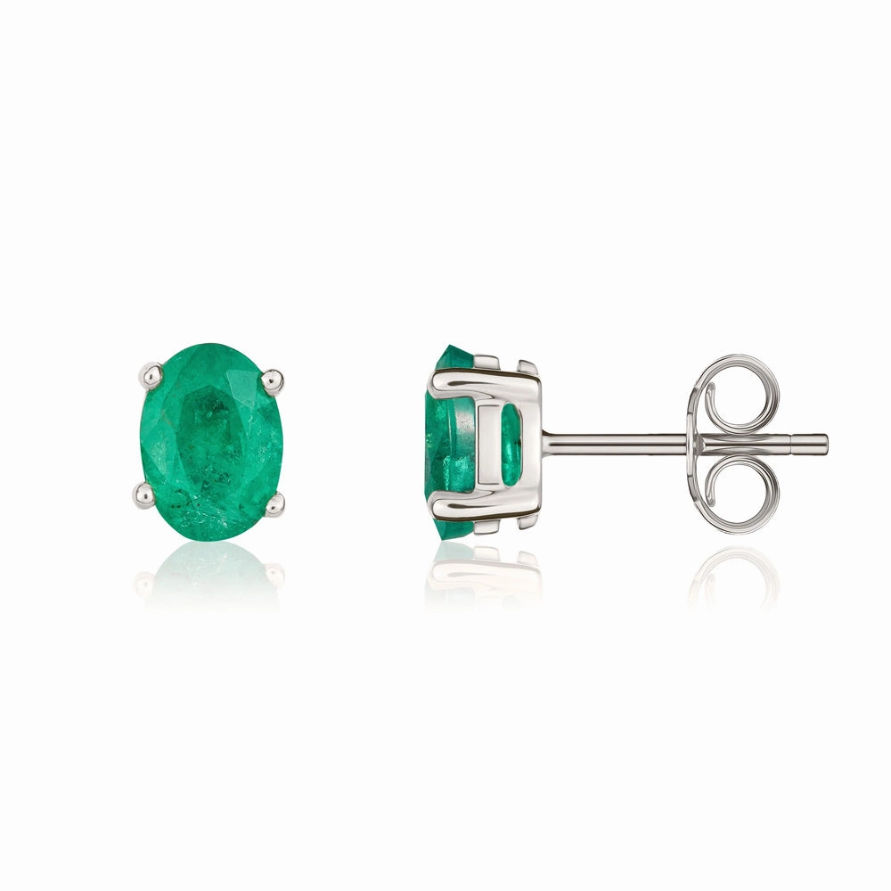 9ct White Gold Emerald 7x5mm Oval Claw Set Stud Earrings