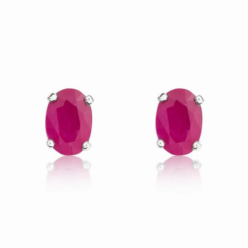 9ct White Gold Ruby 6x4mm Oval Claw Set Stud Earrings