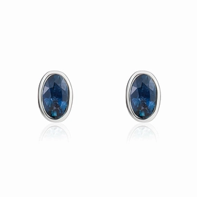 9ct White Gold Sapphire 5x3mm Oval Rub Over Set Stud Earrings