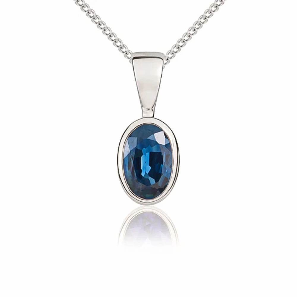 9ct White Gold Sapphire 6x4mm Oval Rub Over Set Pendant