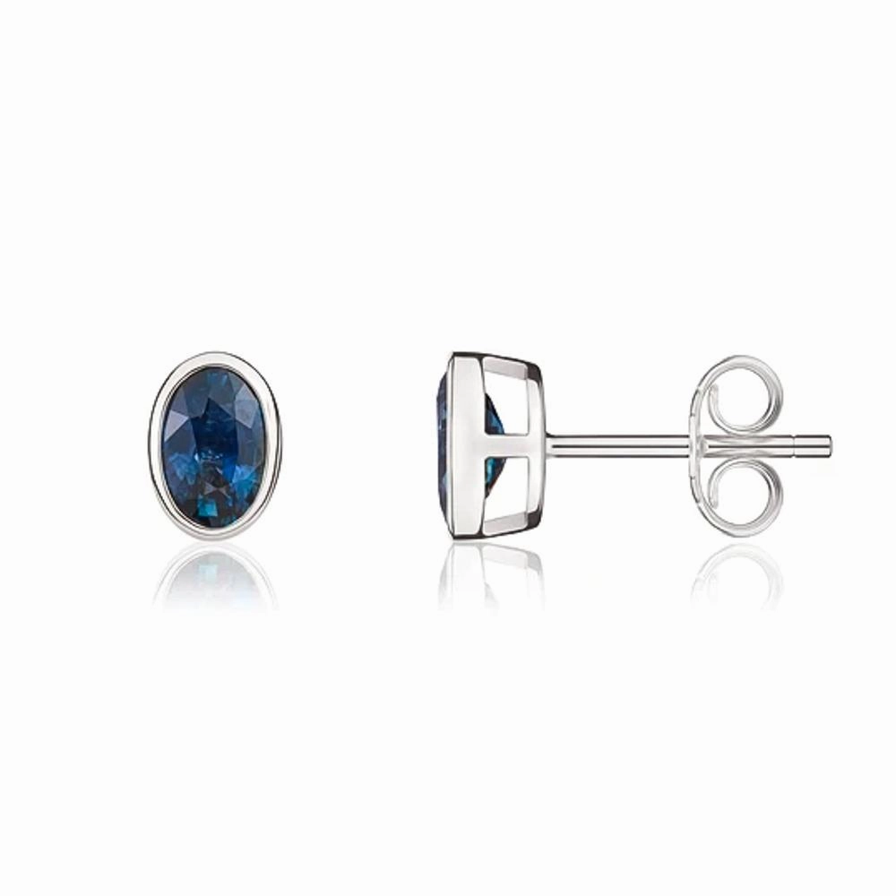 9ct White Gold Sapphire 6x4mm Oval Rub Over Set Stud Earrings
