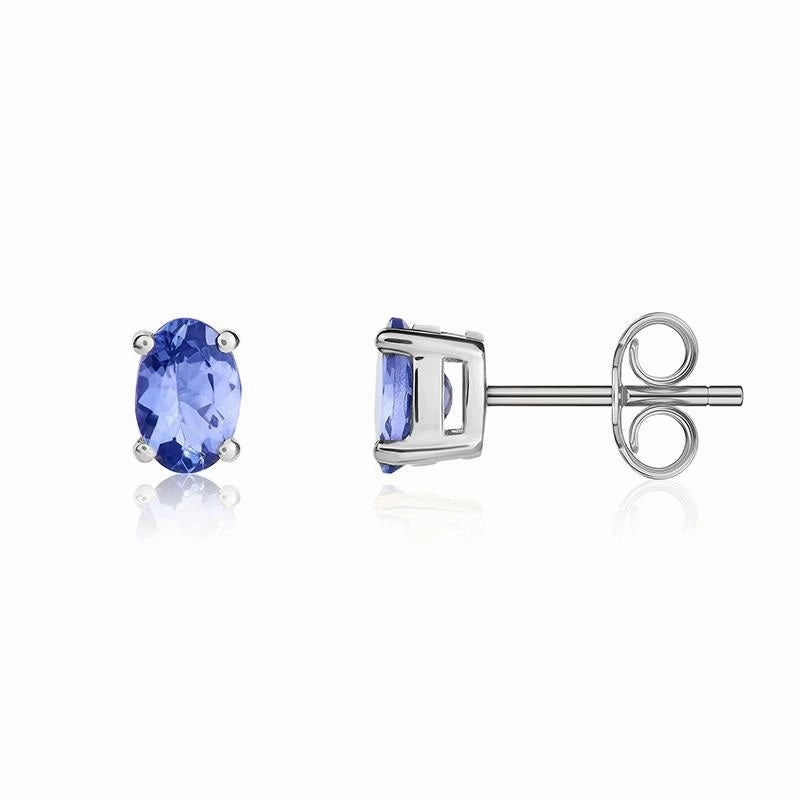 9ct White Gold Tanzanite 6x4mm Oval Claw Set Stud Earrings