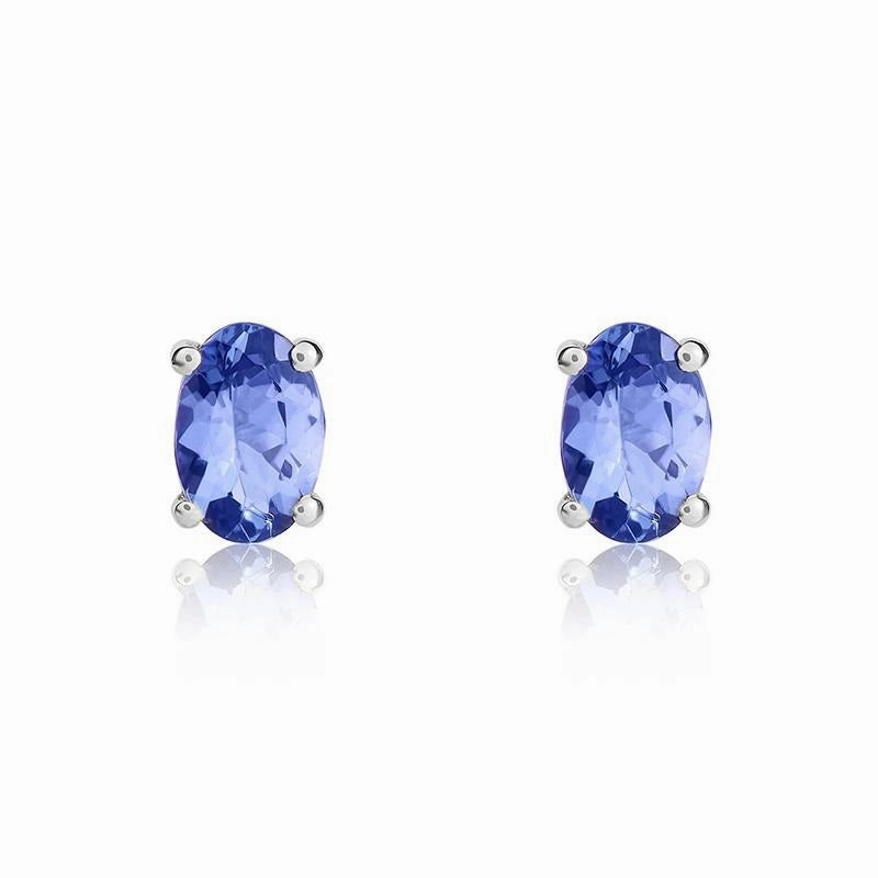 9ct White Gold Tanzanite 6x4mm Oval Claw Set Stud Earrings