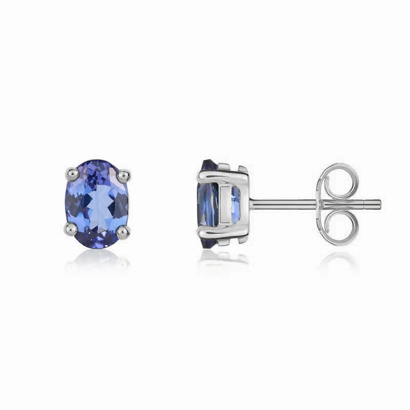 9ct White Gold Tanzanite 7x5mm Oval Claw Set Stud Earrings
