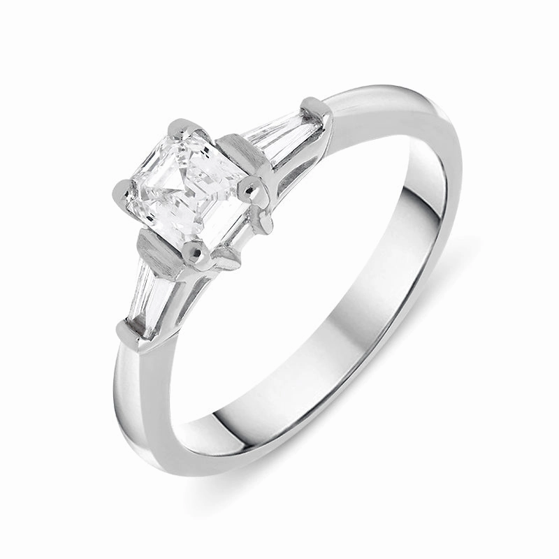 Platinum 0.60ct Emerald Cut Diamond Three Stone Ring