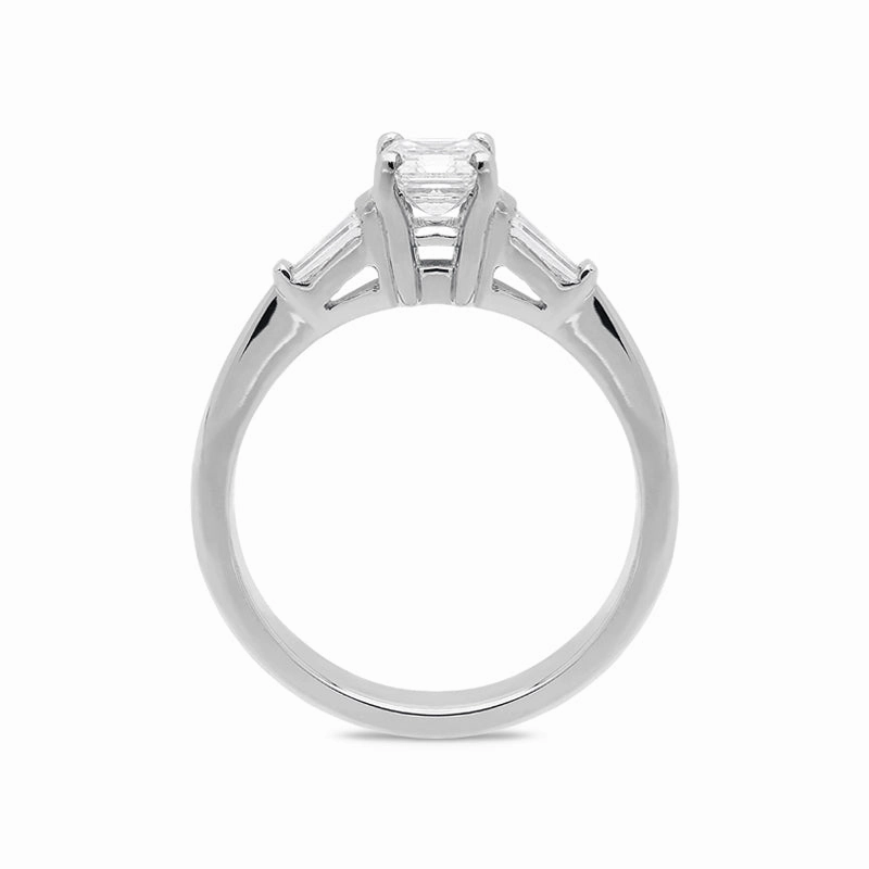 Platinum 0.60ct Emerald Cut Diamond Three Stone Ring