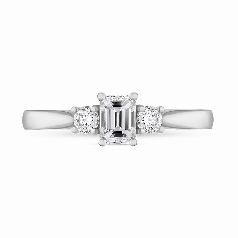 Platinum Diamond Emerald and Round Brilliant Cut Three Stone Ring