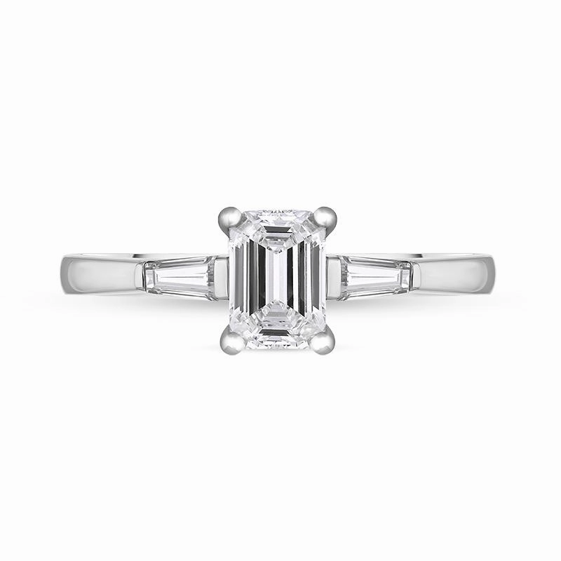 Platinum Diamond Emerald and Tapered Baguette Cut Three Stone Ring