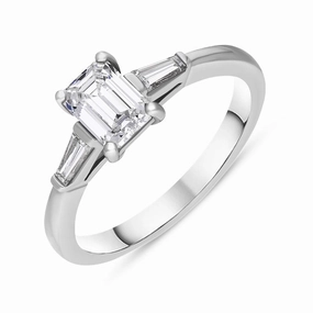 Platinum Diamond Emerald and Tapered Baguette Cut Three Stone Ring